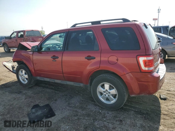 2012 Ford Escape XLT with VIN 1FMCU9DG7CKC66066, listed as a Copart auction lot 59592745 with 138,248 mi miles and Salvage title. Bid and sale history available at DreamBid. Image 2.