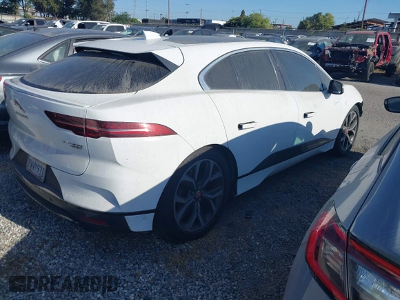 2020 Jaguar I-Pace SE with VIN SADHC2S14L1F85800, listed as a IAAI auction lot 42444115 with 51,249 mi miles and . Bid and sale history available at DreamBid. Image 4.