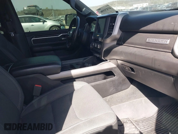 2021 Ram 1500 Big Horn with VIN 1C6SRFFT0MN521027, listed as a IAAI auction lot 41830596 with 55,013 mi miles and . Bid and sale history available at DreamBid. Image 5.
