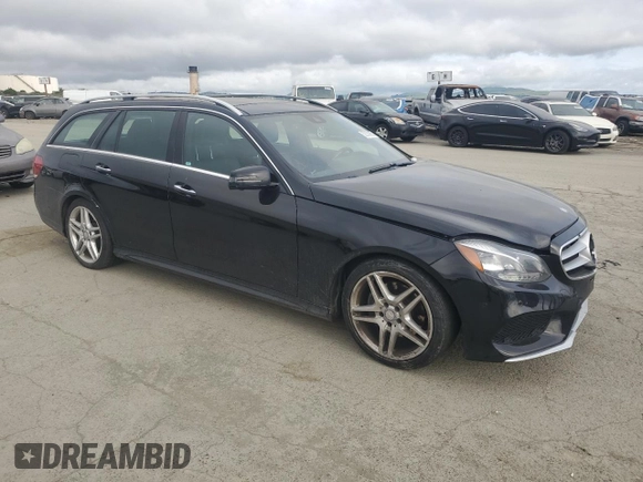 2015 Mercedes-Benz E 350 Luxury with VIN WDDHH8JB0FB083412, listed as a Copart auction lot 52053855 with 117,040 mi miles and Salvage title. Bid and sale history available at DreamBid. Image 4.