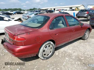 2000 Mercury Mystique GS z VIN 1MEFM6530YK615859, wystawiony jako Copart lot #59704875 z przebiegiem 259 272 mil mil oraz Szkoda całkowita • Salvage title. Historia ofert i sprzedaży dostępna na DreamBid. Obrazek 3.