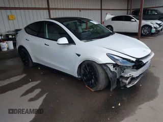 2023 Tesla Model Y Long Range z VIN 7SAYGAEE0PF787216, wystawiony jako IAAI lot #41589954 z przebiegiem 17 985 mil mil oraz . Historia ofert i sprzedaży dostępna na DreamBid. Obrazek 1.
