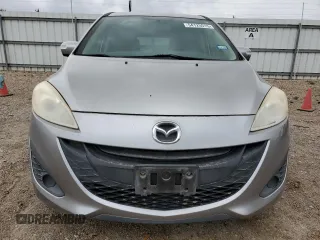 2015 Mazda 5 Sport z VIN JM1CW2BL2F0179147, wystawiony jako Copart lot #54125515 z przebiegiem 94 294 mil mil oraz Szkoda całkowita • Salvage title. Historia ofert i sprzedaży dostępna na DreamBid. Obrazek 5.