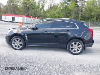2012 Cadillac SRX Performance Collection with VIN 3GYFNEE32CS512118, listed as a IAAI auction lot 42158452 with 143,449 mi miles. Bid and sale history available at carsss.com. Image 14.