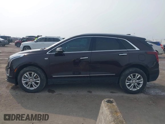 2021 Cadillac XT5 FWD Luxury with VIN 1GYKNAR44MZ184070, listed as a IAAI auction lot 41934265 with 60,596 mi miles and . Bid and sale history available at DreamBid. Image 14.