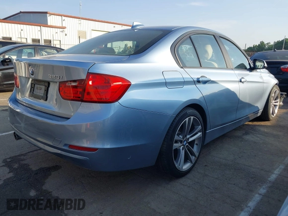 2012 BMW 3 Series 328i with VIN WBA3A5C50CF346823, listed as a IAAI auction lot 42161682 with 76,729 mi miles and . Bid and sale history available at carsss.com. Image 4.