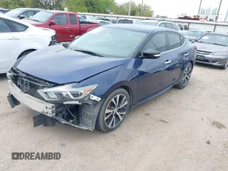 2016 Nissan Maxima S with VIN 1N4AA6AP4GC445341, listed as a IAAI auction lot 41890630 with 121,115 mi miles and . Bid and sale history available at DreamBid. Image 18.