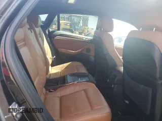 2012 BMW X6 50i z VIN 5UXFG8C59CLZ97030, wystawiony jako Copart lot #53632795 z przebiegiem 109 933 mil mil oraz Czysty tytuł • Clean title. Historia ofert i sprzedaży dostępna na DreamBid. Obrazek 11.