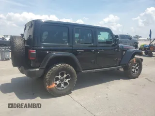 2022 Jeep Wrangler Unlimited Rubicon with VIN 1C4HJXFG1NW193437, listed as a Copart auction lot 57137365 with 56,732 mi miles and Salvage title. Bid and sale history available at DreamBid. Image 3.