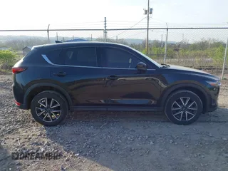 2018 Mazda CX-5 Grand Touring with VIN JM3KFBDM2J0463279, listed as a IAAI auction lot 42115309 with 68,851 mi miles. Bid and sale history available at carsss.com. Image 13.
