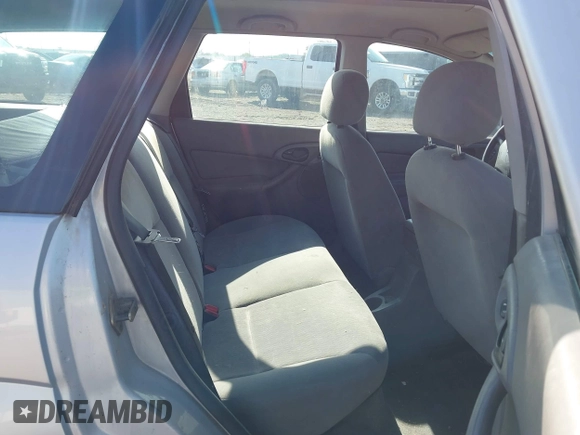 2001 Ford Focus SE z VIN 1FAFP363X1W343475, wystawiony jako IAAI lot #42390133 z przebiegiem 127 282 mil mil oraz . Historia ofert i sprzedaży dostępna na DreamBid. Obrazek 8.