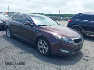 2013 Kia Optima EX z VIN 5XXGN4A78DG104355, wystawiony jako IAAI lot #42450123 z przebiegiem 199 419 mil mil oraz . Historia ofert i sprzedaży dostępna na DreamBid. Obrazek 1.