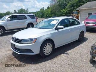 2017 Volkswagen Jetta S z VIN 3VW2B7AJ8HM242804, wystawiony jako IAAI lot #42595566 z przebiegiem 96 551 mil mil oraz . Historia ofert i sprzedaży dostępna na DreamBid. Obrazek 19.