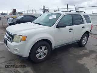 2011 Ford Escape XLT with VIN 1FMCU0D79BKA38578, listed as a IAAI auction lot 41895971 with 223,689 mi miles. Bid and sale history available at carsss.com. Image 2.