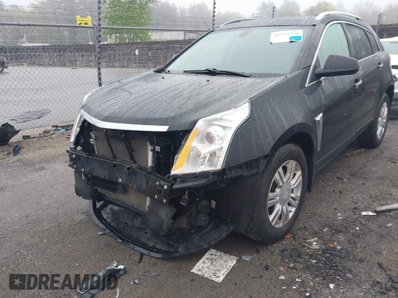 2014 Cadillac SRX Luxury Collection z VIN 3GYFNEE32ES643679, wystawiony jako IAAI lot #42172274 z przebiegiem 122 276 mil mil oraz . Historia ofert i sprzedaży dostępna na DreamBid. Obrazek 6.