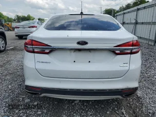 2017 Ford Fusion SE z VIN 3FA6P0H92HR203496, wystawiony jako Copart lot #56719365 z przebiegiem 99 817 mil mil oraz Szkoda całkowita • Salvage title. Historia ofert i sprzedaży dostępna na DreamBid. Obrazek 6.