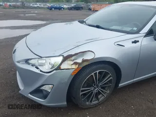 2015 Scion FR-S z VIN JF1ZNAA10F9704134, wystawiony jako IAAI lot #42167308 z przebiegiem 130 242 mil mil oraz . Historia ofert i sprzedaży dostępna na DreamBid. Obrazek 6.