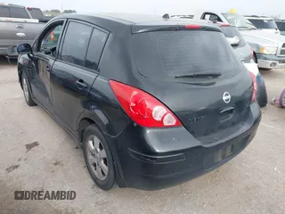 2009 Nissan Versa 1.8 SL with VIN 3N1BC13E59L496882, listed as a IAAI auction lot 41798734 with 210,907 mi miles. Bid and sale history available at carsss.com. Image 3.