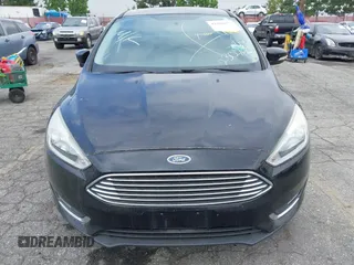 2017 Ford Focus Titanium with VIN 1FADP3N2XHL230766, listed as a IAAI auction lot 42386275 with 64,138 mi miles and . Bid and sale history available at DreamBid. Image 6.