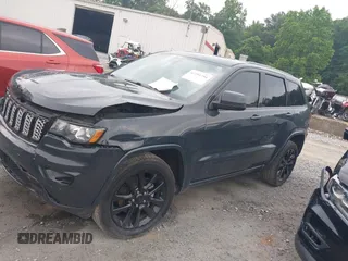 2018 Jeep Grand Cherokee Upland with VIN 1C4RJFAG4JC249243, listed as a IAAI auction lot 42291794 with 194,501 mi miles and . Bid and sale history available at DreamBid. Image 14.