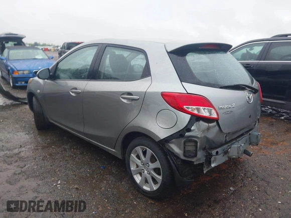 2011 Mazda 2 Sport with VIN JM1DE1HY1B0127409, listed as a IAAI auction lot 42015727 with 154,385 mi miles. Bid and sale history available at carsss.com. Image 3.