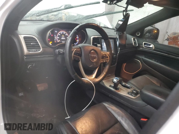 2015 Jeep Grand Cherokee Summit with VIN 1C4RJFJG9FC794992, listed as a Copart auction lot 42790355 with 74,044 mi miles and Salvage Title. Bid and sale history available at DreamBid. Image 8.