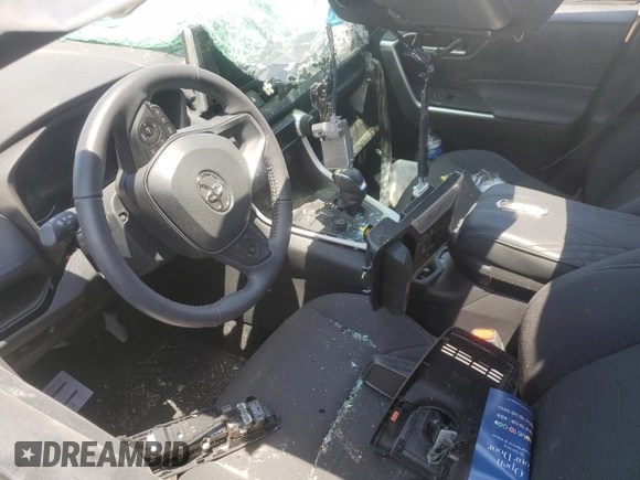2023 Toyota RAV4 Hybrid SE with VIN 4T3T6RFV6PU106588, listed as a Copart auction lot 57611575 with Not provided miles and Salvage title. Bid and sale history available at DreamBid. Image 8.