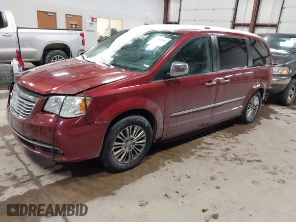 2011 Chrysler Town & Country Limited with VIN 2A4RR6DG6BR610723, listed as a IAAI auction lot 41618665 with 165,993 mi miles. Bid and sale history available at carsss.com. Image 2.