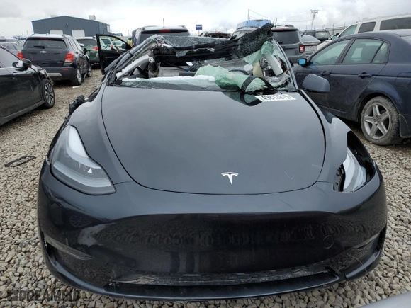 2025 Tesla Model Y Long Range with VIN 7SAYGDEE5SF303938, listed as a Copart auction lot 49817915 with 0 mi miles and Clean Title. Bid and sale history available at carsss.com. Image 5.