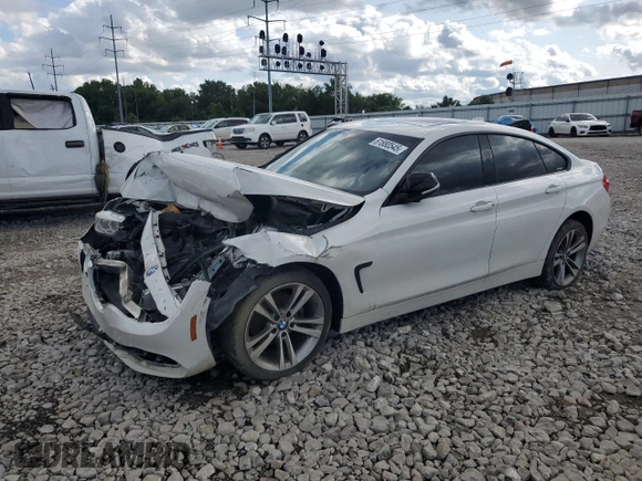 2015 BMW 4 Series 428i xDrive with VIN WBA4A7C53FD415066, listed as a Copart auction lot 61880545 with 130,874 mi miles and Salvage title. Bid and sale history available at DreamBid. Image 1.