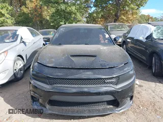 2021 Dodge Charger R/T with VIN 2C3CDXCT1MH574807, listed as a IAAI auction lot 40715181 with 51,620 mi miles and . Bid and sale history available at carsss.com. Image 12.