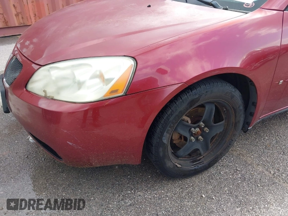 2009 Pontiac G6 1SA with VIN 1G2ZG57B894214459, listed as a IAAI auction lot 42219090 with 325,394 mi miles and . Bid and sale history available at DreamBid. Image 6.