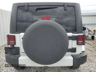 2016 Jeep Wrangler Sahara with VIN 1C4AJWBG5GL157885, listed as a Copart auction lot 51100655 with 73,090 mi miles and Salvage title. Bid and sale history available at DreamBid. Image 6.