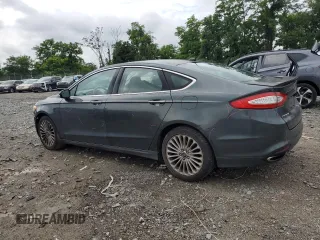 2016 Ford Fusion Titanium with VIN 3FA6P0K95GR158075, listed as a Copart auction lot 64476715 with 137,656 mi miles and Salvage title. Bid and sale history available at DreamBid. Image 2.