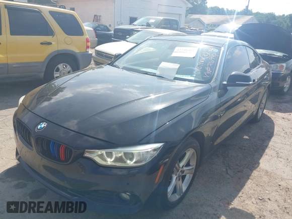 2014 BMW 4 Series 428i xDrive with VIN WBA3N5C52EF716998, listed as a IAAI auction lot 42548467 with 212,418 mi miles and . Bid and sale history available at DreamBid. Image 2.
