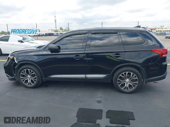 2017 Mitsubishi Outlander ES z VIN JA4AZ2A3XHZ052168, wystawiony jako IAAI lot #42194062 z przebiegiem 209 195 mil mil oraz . Historia ofert i sprzedaży dostępna na DreamBid. Obrazek 14.