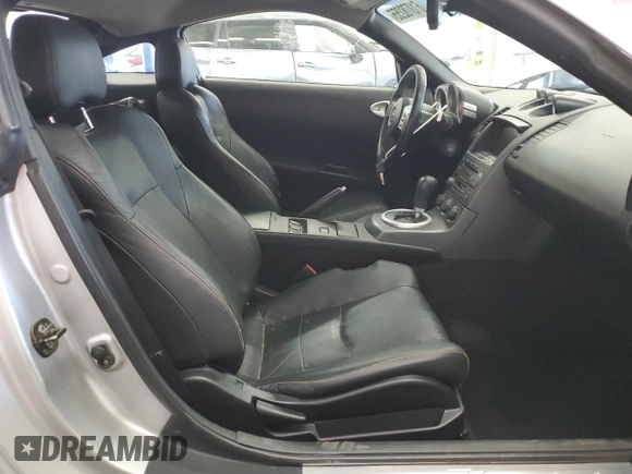 2003 Nissan 350Z Touring с VIN JN1AZ34D03T114076, выставлен на аукционе Copart как лот 61078255 с пробегом 187 952 миль миль и Списание • Salvage title. История ставок и продаж доступна на DreamBid. Изображение 7.