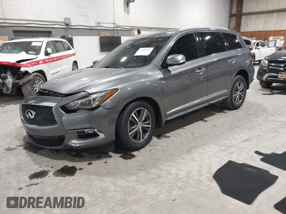 2017 Infiniti QX60 with VIN 5N1DL0MM1HC528514, listed as a IAAI auction lot 41986931 with 90,033 mi miles and . Bid and sale history available at DreamBid. Image 2.