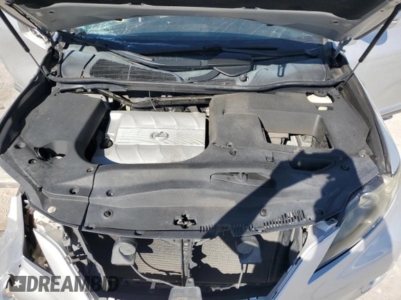 2012 Lexus RX 350 with VIN 2T2ZK1BA6CC069052, listed as a Copart auction lot 77817514 with 132,615 mi miles and Salvage Title. Bid and sale history available at DreamBid. Image 12.