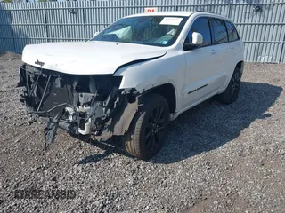 2018 Jeep Grand Cherokee Altitude with VIN 1C4RJFAG4JC309523, listed as a IAAI auction lot 42159534 with 86,682 mi miles and . Bid and sale history available at DreamBid. Image 17.