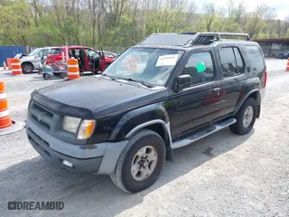 2000 Nissan Xterra XE with VIN 5N1ED28Y9YC604703, listed as a IAAI auction lot 42095801 with 250,603 mi miles. Bid and sale history available at carsss.com. Image 2.