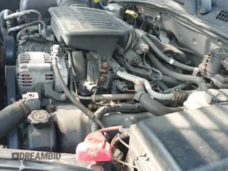 2005 Dodge Dakota SLT with VIN 1D7HW48N95S287753, listed as a IAAI auction lot 42806103 with 166,000 mi miles and . Bid and sale history available at DreamBid. Image 13.