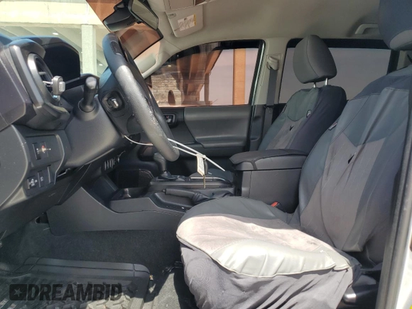 2022 Toyota Tacoma SR with VIN 3TYAX5GN2NT045965, listed as a Copart auction lot 58240835 with 54,231 mi miles and Salvage title. Bid and sale history available at DreamBid. Image 7.