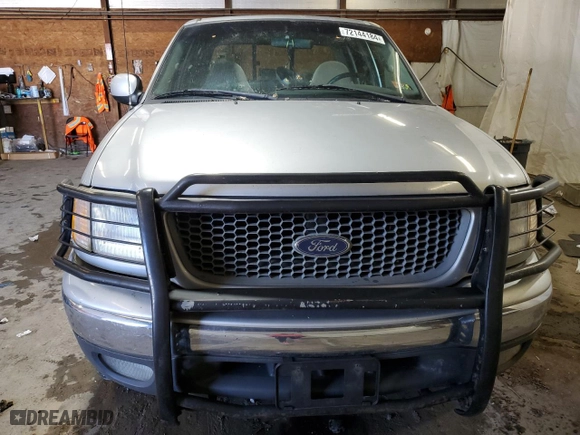 2001 Ford F-150 SuperCrew XLT with VIN 1FTRW08L41KD94810, listed as a Copart auction lot 72144184 with 191,313 mi miles and Salvage Title. Bid and sale history available at carsss.com. Image 5.