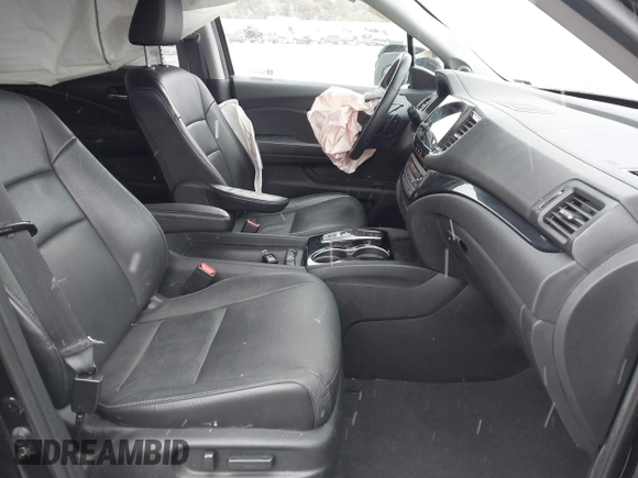 2021 Honda Pilot Touring 8-Passenger z VIN 5FNYF6H94MB091384, wystawiony jako IAAI lot #41567070 z przebiegiem 78 330 mil mil oraz . Historia ofert i sprzedaży dostępna na DreamBid. Obrazek 5.