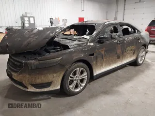 2014 Ford Taurus SEL with VIN 1FAHP2E81EG136022, listed as a IAAI auction lot 41937132 with 76,285 mi miles and . Bid and sale history available at DreamBid. Image 2.