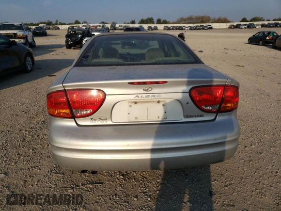 2004 Oldsmobile Alero GX z VIN 1G3NK52F94C146979, wystawiony jako Copart lot #69420344 z przebiegiem 101 408 mil mil oraz Szkody całkowita. Historia ofert i sprzedaży dostępna na DreamBid. Obrazek 6.