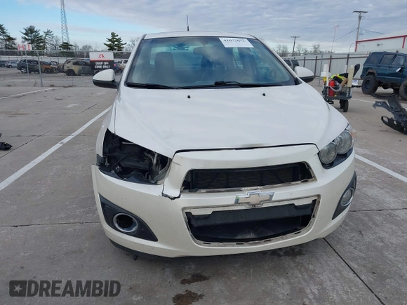 2014 Chevrolet Sonic LTZ with VIN 1G1JE5SH3E4133088, listed as a IAAI auction lot 41072056 with 143,855 mi miles. Bid and sale history available at carsss.com. Image 6.