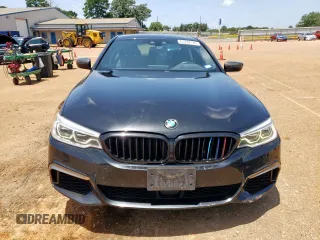 2018 BMW 5 Series M550i xDrive with VIN WBAJB9C54JB286450, listed as a Copart auction lot 61232125 with 88,479 mi miles and Salvage title. Bid and sale history available at DreamBid. Image 5.