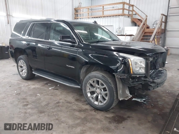 2016 GMC Yukon SLT with VIN 1GKS2BKC9GR176948, listed as a IAAI auction lot 41361221 with 125,178 mi miles. Bid and sale history available at carsss.com. Image 1.